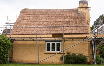 Clench thatch roofing costs